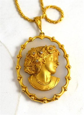 Lot 367 - A diamond set maiden's head pendant on a 9ct gold chain