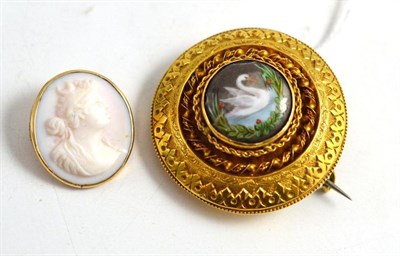 Lot 371 - A cameo brooch and a round brooch with swan panel insert and locket back