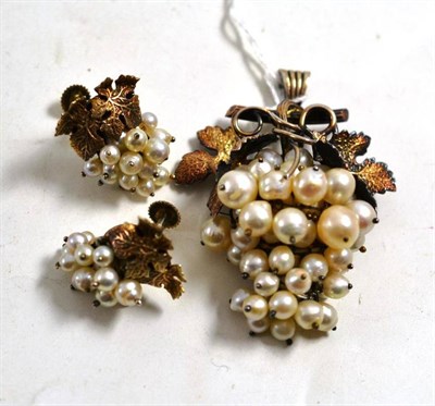 Lot 3 - A cultured pearl brooch/pendant, modelled as a bunch of grapes with vine leaf decorations, and...