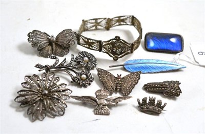 Lot 9 - Enamelled silver feather brooch, eight other assorted silver and filigree brooches and a...