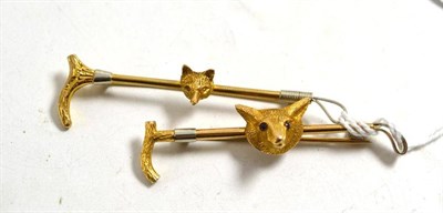 Lot 10 - Two fox mask and crop bar brooches, one with ruby set eyes, both stamped '9CT'