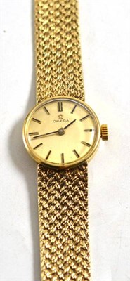 Lot 56 - A lady's 9ct gold wristwatch, signed Omega, 1969, 19mm wide