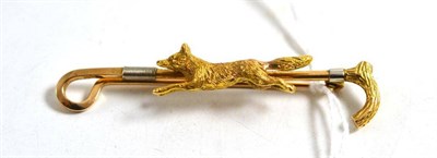 Lot 59 - A fox and crop bar pin, stamped '15', length 6.5cm
