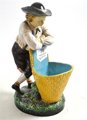 Lot 78 - A Minton majolica sweetmeat dish as a youth with grape pannier, 25cm high