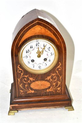 Lot 79 - An inlaid rosewood veneered striking mantel clock, circa 1900, 31cm high