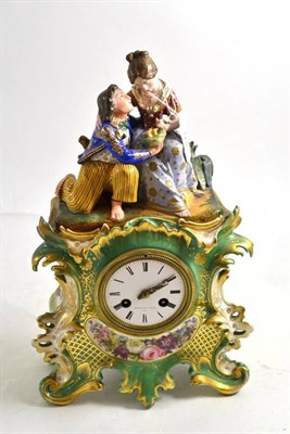 Lot 93 - A French porcelain striking mantel clock, signed Potonie, Paris, no.490, circa 1880, figural...