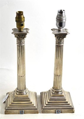 Lot 98 - Masonic interest: A pair of silver Corinthian column table lamps presented by The Charity Lodge no.