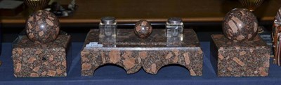 Lot 109 - Red granite three piece desk set