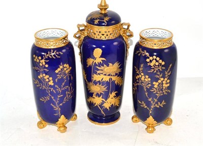 Lot 112 - A Royal Worcester blue ground and gilt decorated vase and cover, 29cm high; and a pair of blue...