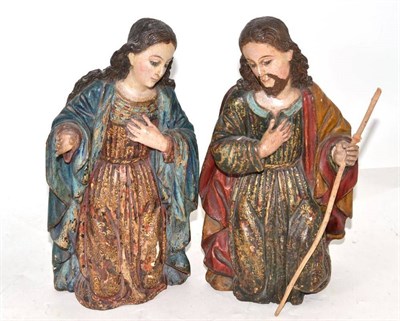 Lot 134 - Pair of antique South American carved wood nativity figures of the Virgin and St Joseph