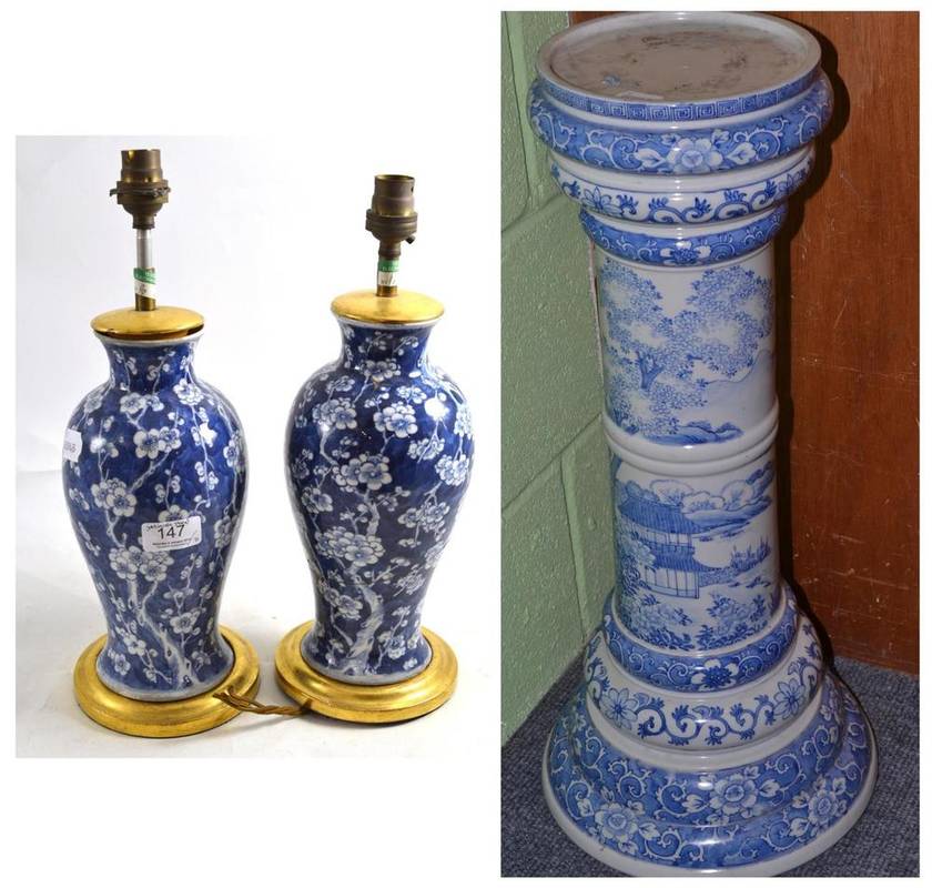 Lot 147 - A Japanese blue and white jardiniere stand circa 1900, 64cm high and pair of late 19th century blue