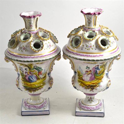 Lot 148 - A pair of faience flower vases, 29cm high