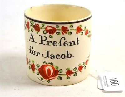 Lot 160 - A Leeds creamware mug inscribed ";A present for Jacob"