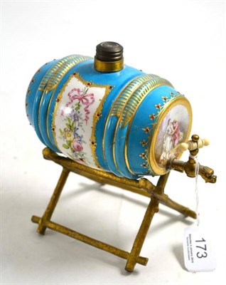 Lot 173 - A late 19th century Sèvres bleu de ciel barrel upon ormolu stand (2)