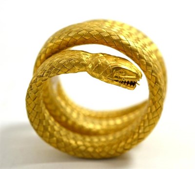 Lot 209 - A sprung gold plated woven snake bangle