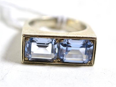 Lot 232 - A light blue spinel set ring (probably synthetic spinel), stamped '900', finger size M