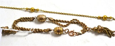 Lot 233 - Yellow albertina bracelet with an applied plaque stamped '9CT' and a gilt metal chain