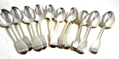 Lot 239 - A set of six Victorian silver fiddle pattern dessert spoons, engraved with a monogram, London...