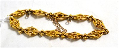 Lot 251 - A fancy link bracelet, with French gold marks, length 19.5cm