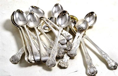 Lot 261 - A set of twelve silver King's pattern teaspoons engraved with a crest, a similar mustard spoon...