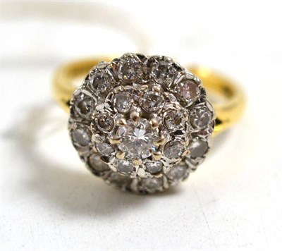 Lot 269 - An 18ct gold diamond cluster ring, total estimated diamond weight 0.75 carat approximately,...