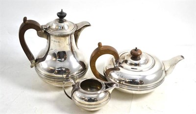 Lot 283 - Matched silver three piece tea service, London Assay 1936