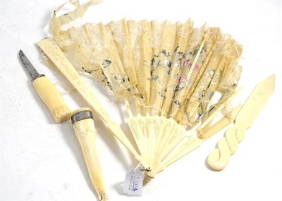 Lot 289 - Carved ivory page turner, steel dagger in carved ivory sheath and an early 20th century fan...