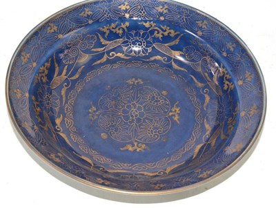 Lot 302 - A Japanese porcelain blue ground and gilt bowl, 19th century, with formal repeat floral...