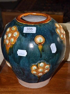 Lot 335 - A Chinese glazed terracotta vase, 26cm high