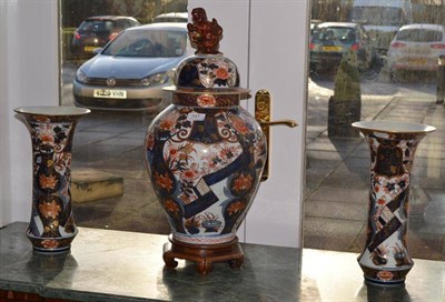 Lot 347 - Japanese Imari vase and cover and hardwood stand (56cm high), a pair of similar vases (34cm...