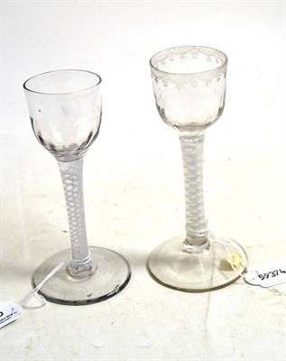 Lot 355 - Two 18th century opaque twist stem wine glasses