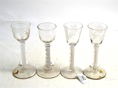 Lot 362 - Four 18th century opaque twist wine glasses (a.f.)