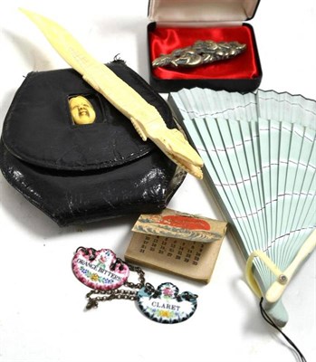 Lot 373 - A small printed calendar dated 1904, 1920's Japanese lady's purse/compact, decorative fan,...