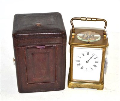 Lot 380 - A gilt brass striking and repeating carriage clock, movement stamped R & C, circa 1900, with fitted