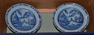 Lot 412 - A pair of matched 18th century English Delft chargers, 34cm diameter