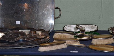 Lot 417 - Two silver plated trays, pair of plated bottle coasters, silver and enamel dressing table...