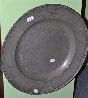 Lot 426 - A large pewter charger with a crest, possibly Stuart, 54cm diameter