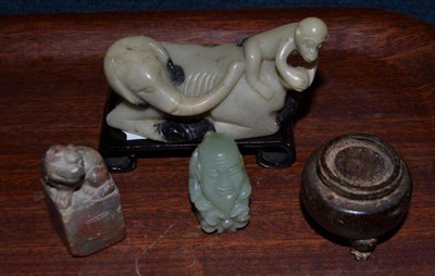 Lot 446 - A Chinese jade-type carving of Shoulao on stand, a soapstone chop, a soapstone elephant and...