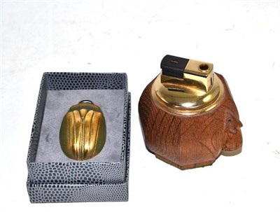 Lot 447 - A Robert 'Mouseman' Thompson lighter and a Lalique scarab