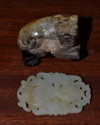 Lot 449 - A Chinese jade recumbent fo dog on stand and a jade type double gourd pendant (2)