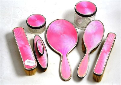 Lot 461 - French silver and pink enamel dressing table set comprising hand mirror, three brushes, two...