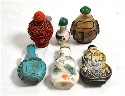 Lot 471 - Four assorted Chinese snuff bottles, 20th century and a tiny porcelain vase (5)