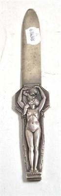 Lot 474 - An Art Deco silvered metal paper knife, signed Lucien Bazor, 1928, the handle worked with a...