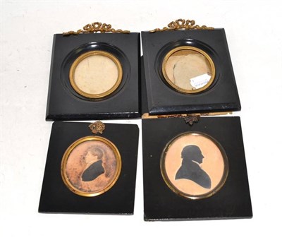 Lot 477 - Pair of ebonised and gilt miniature frames, a miniature portrait of a gentleman and a silhouette of