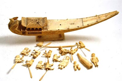 Lot 481 - Carved ivory boat with figures