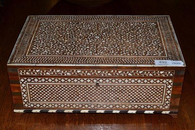 Lot 492 - An Indian ivory inlaid writing box, late 19th century, with chequered floret and leafy scroll...