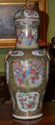 Lot 495 - A Chinese Canton decorated porcelain large baluster vase and cover, late 19th century, with typical