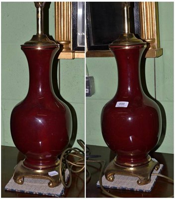 Lot 498 - Pair of sang de boeuf style table lamps