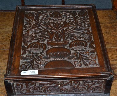 Lot 503 - A 17th century carved oak wall cabinet, 46cm high