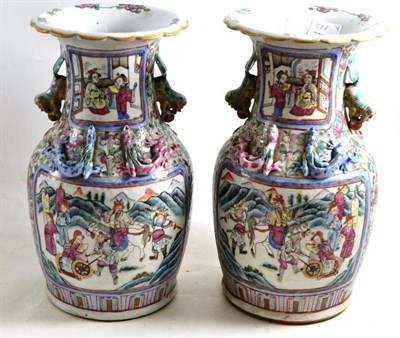 Lot 526 - A pair of Cantonese porcelain baluster vases, height 34cm